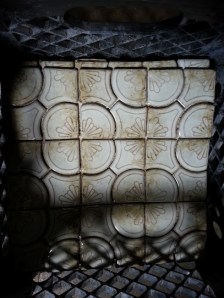 It is hard to see but these unused tiles are iridescent cream and avocado green 